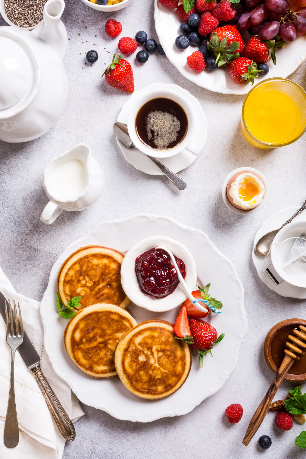 Breakfast table with pancakes and berries and specialty coffee good coffee tastiest coffee