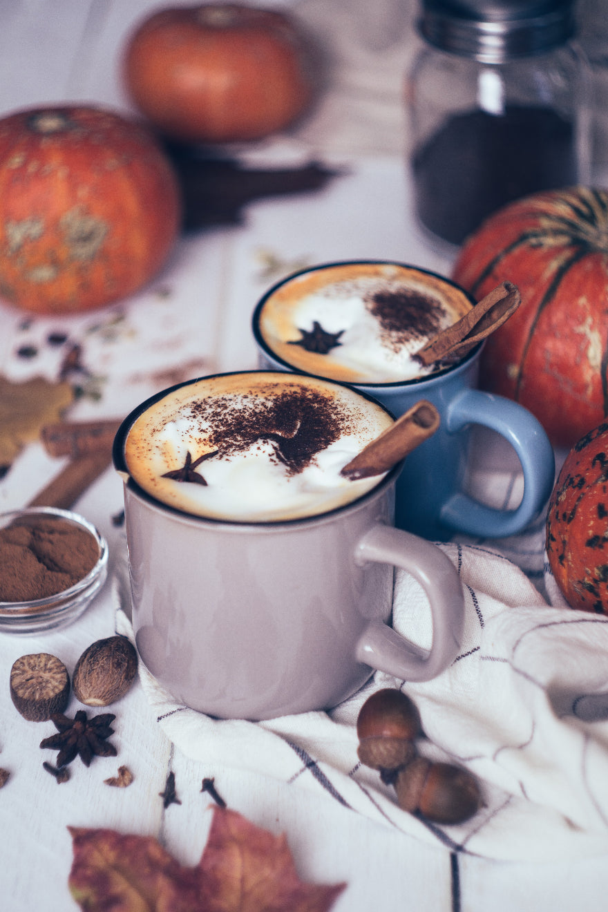 Pumpkin Spice Coffee in two mugs looking delicious. Tastiest coffee, good coffee, freshly roasted.