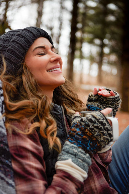 Woman enjoying a cup of coffee while hiking