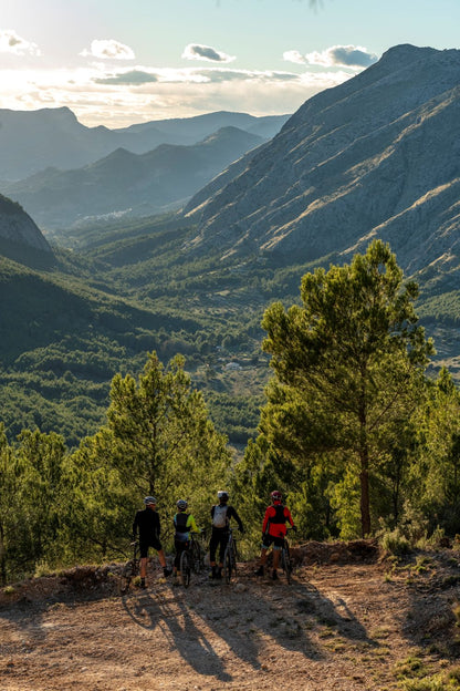Group of bikers taking in the breathtaking mountain view