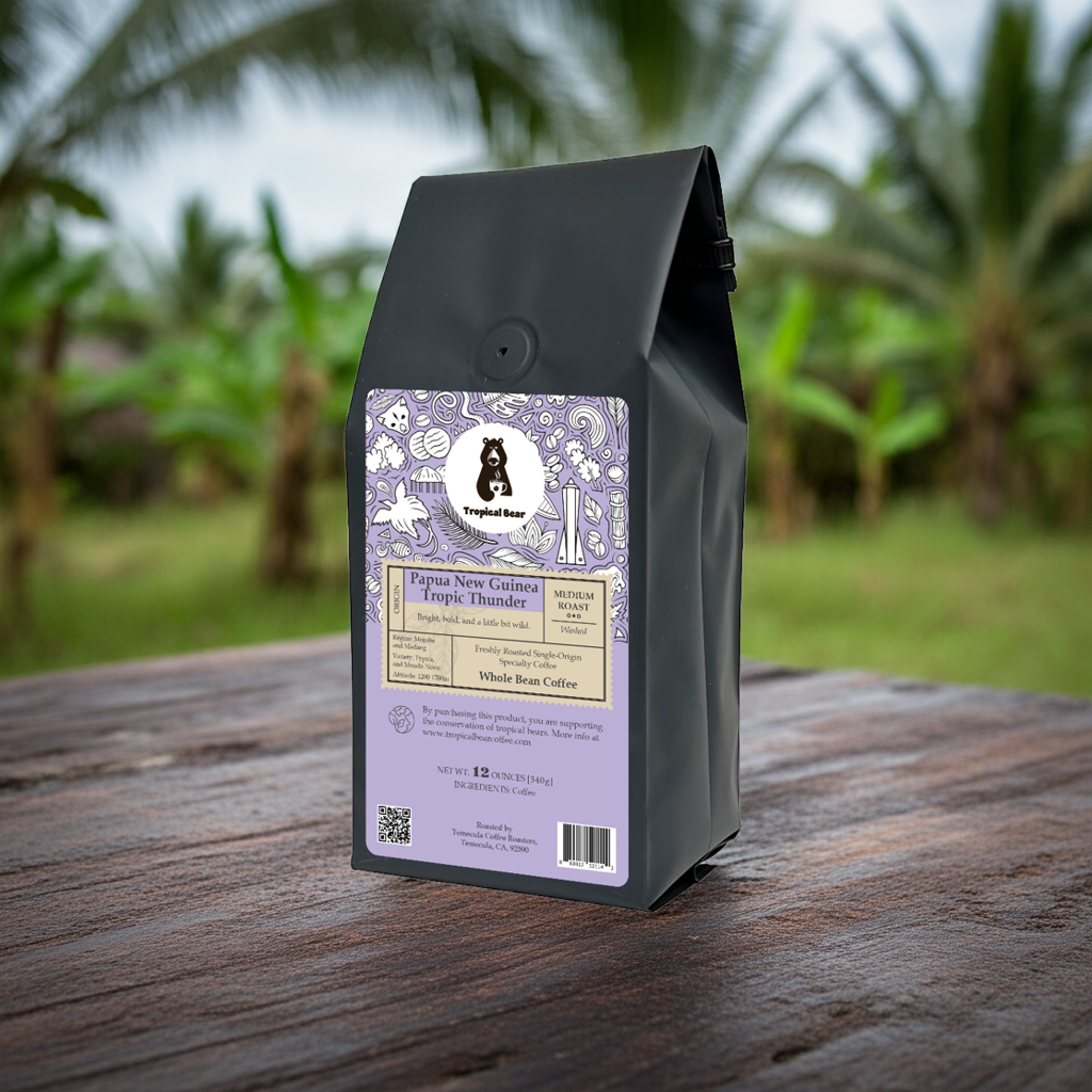 A bag of Papua New Guinea Single Origin Specialty Coffee placed on a table in the jungle.