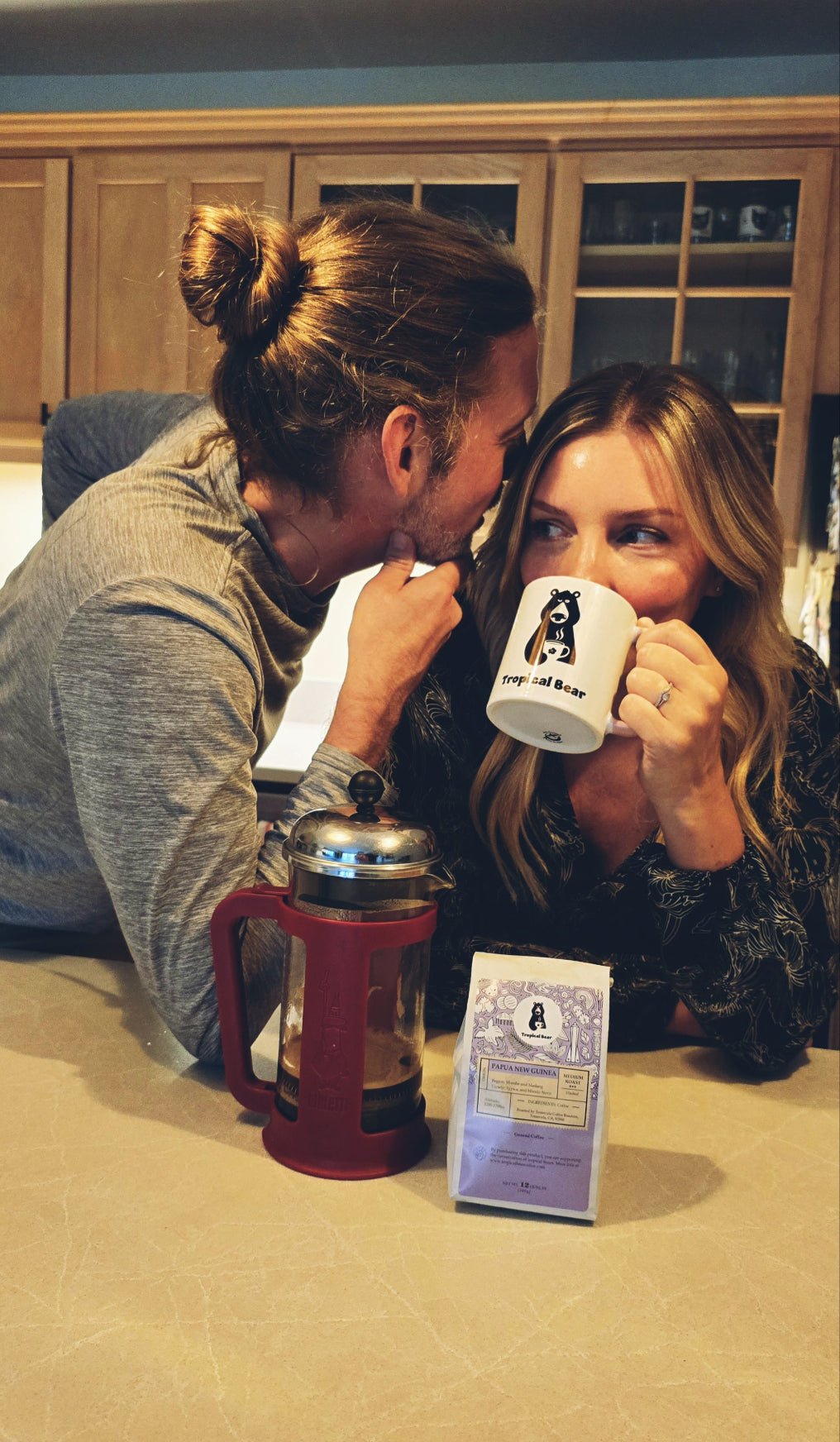 Monica and Austin indulged in a cup of Papua New Guinea single-origin coffee in their kitchen after using a French press.