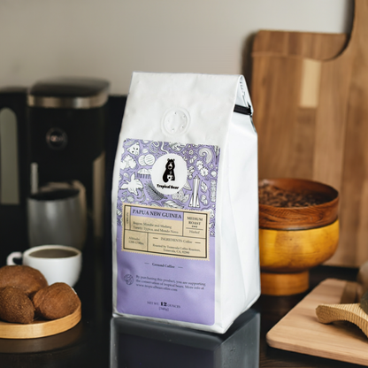 The bag of Tropical Bear Single Origin Organic Coffee from Papua New Guinea on a kitchen counter, created by AI.