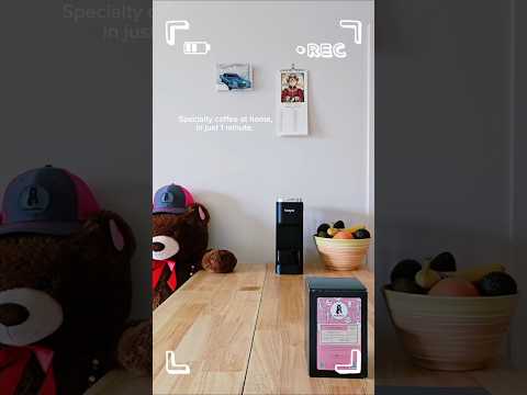 Brewing specialty coffee at home using single-use pods.