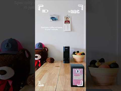 Brewing specialty coffee at home using single-use pods.